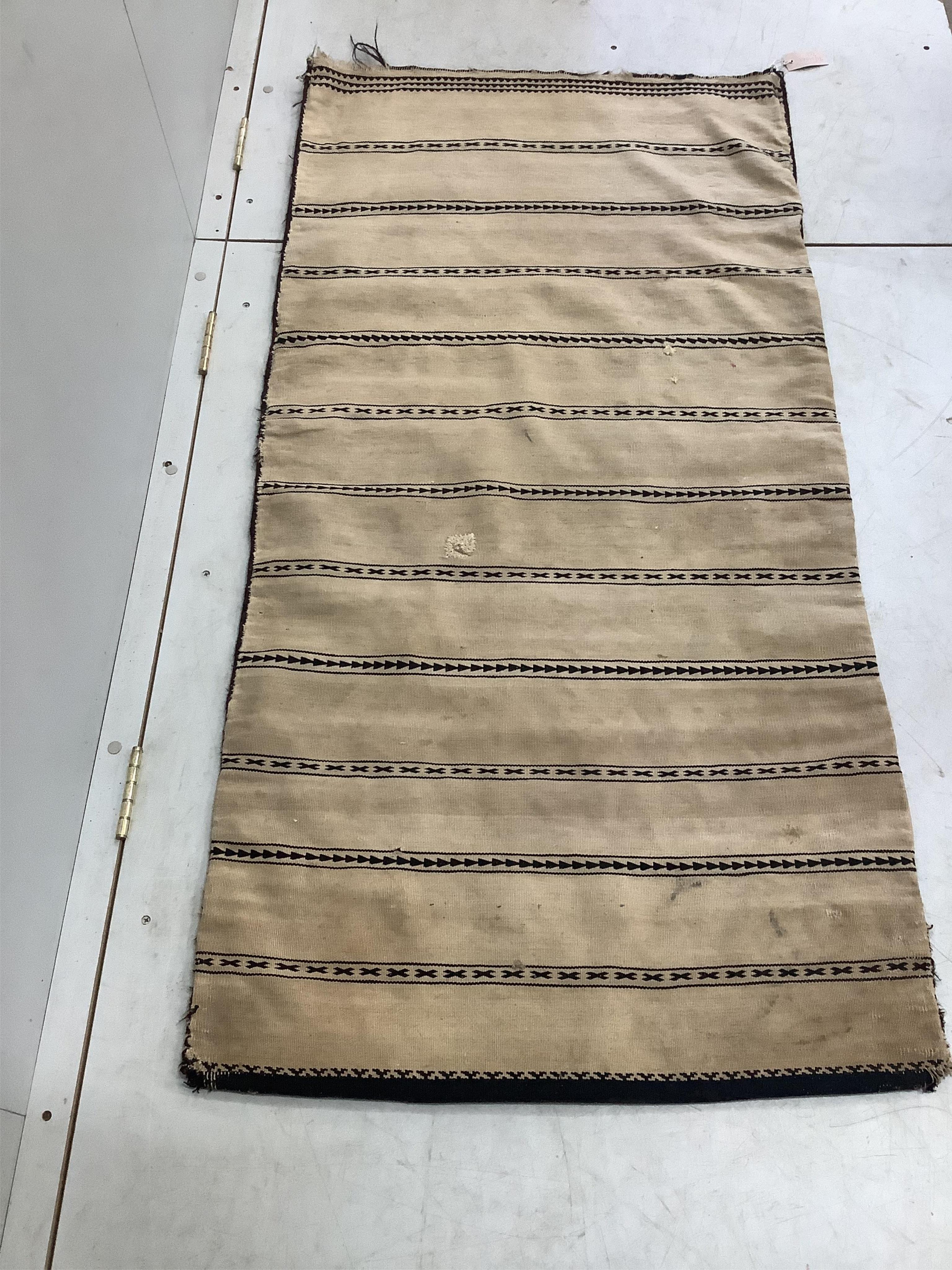 An Afghan flatweave salt bag, a double saddle bag and one other bag, largest approximately 120 x 80cm